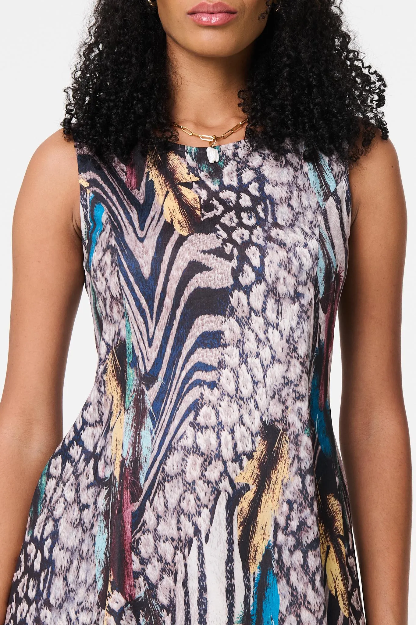 Animal Print Sleeveless Curve Hem Top