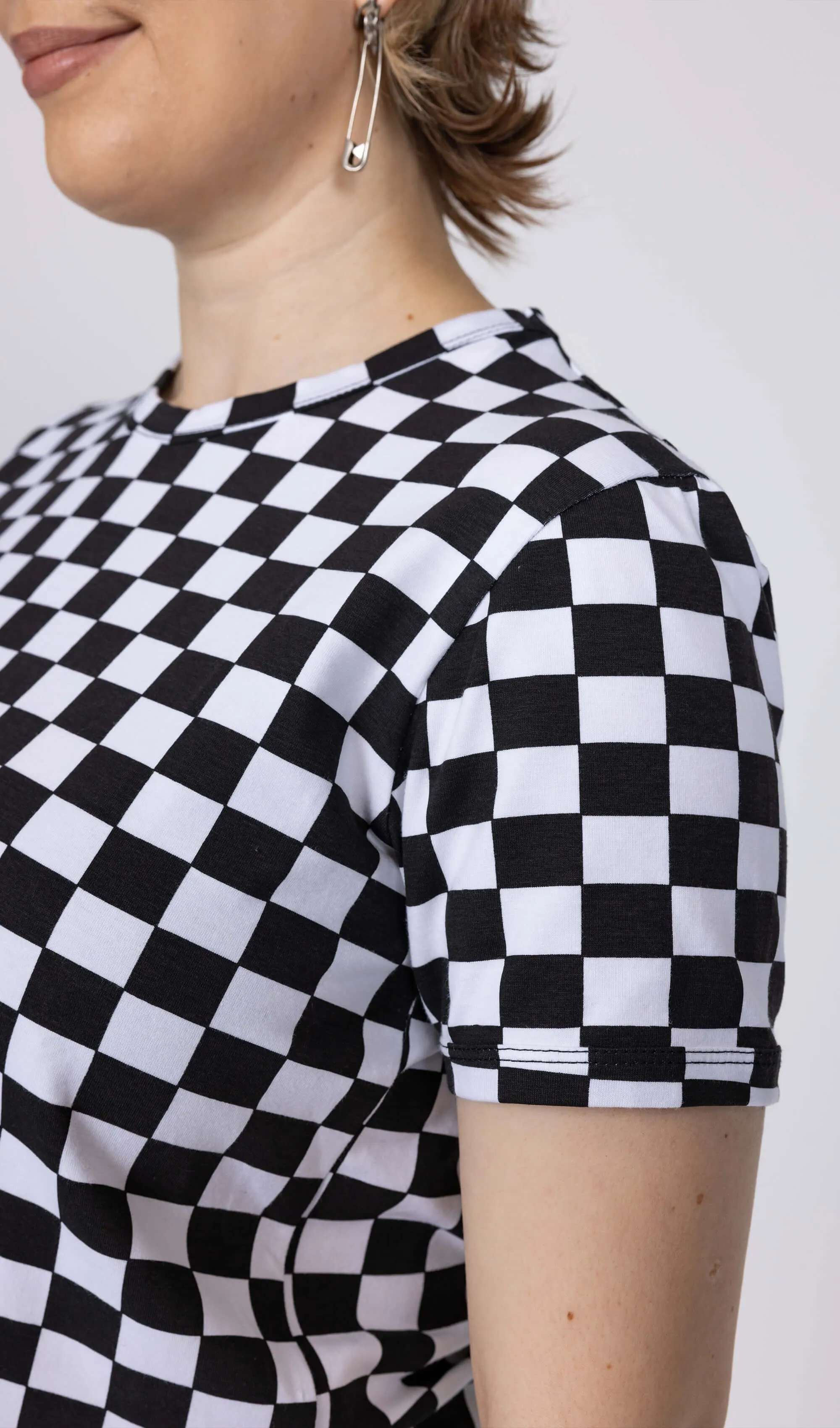 Run & Fly - Checkerboard Short Sleeve Crop Tee